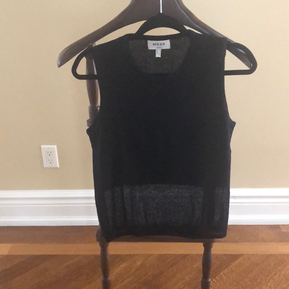 Next black sleeveless top with sheer bottom.